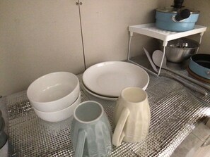 Fridge, microwave, stovetop, cookware/dishes/utensils