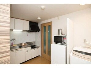 Fridge, microwave, stovetop, cookware/dishes/utensils