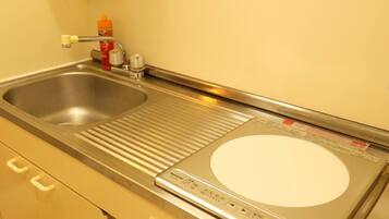 Fridge, microwave, stovetop, cookware/dishes/utensils