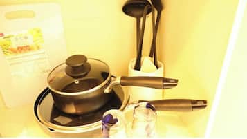 Fridge, microwave, stovetop, cookware/dishes/utensils