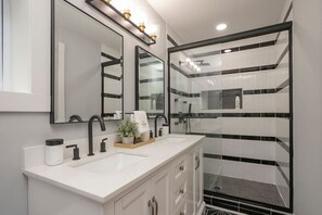 Bathtub, hair dryer, shampoo
