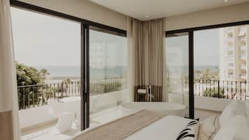 Deluxe Studio, Terrace, Sea View | Minibar, in-room safe, individually decorated, desk
