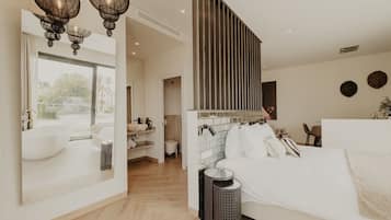 Deluxe Studio, Terrace, Sea View | Minibar, in-room safe, individually decorated, desk