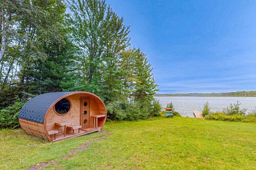 Dog-friendly lakefront home with boat access, deck, fireplace, gas grill, kayaks