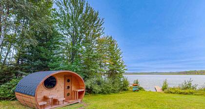 Dog-friendly lakefront home with boat access, deck, fireplace, gas grill, kayaks
