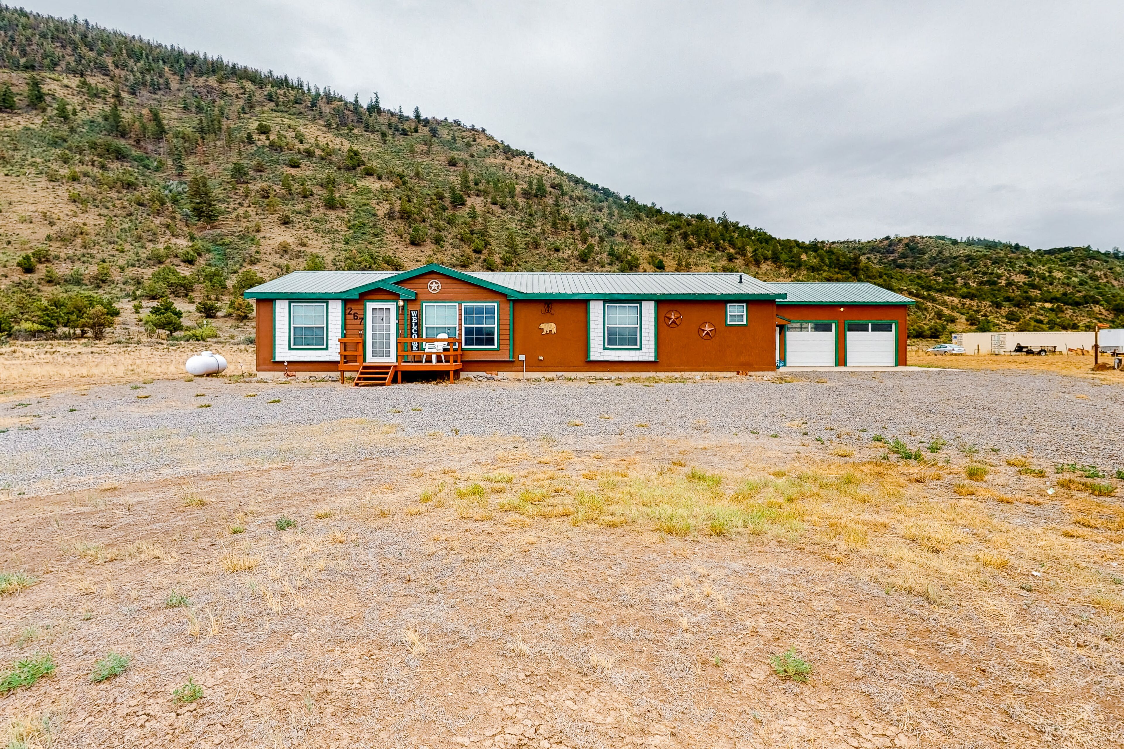 Secluded home with RV parking & hookup, fast WiFi, & fire pit - dogs OK