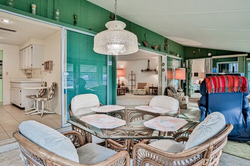 Relax, Work, or Play  in this Retro Waterfront Home with Sunsets & Private Dock