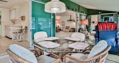 Relax, Work, or Play in this Retro Waterfront Home with Sunsets & Private Dock