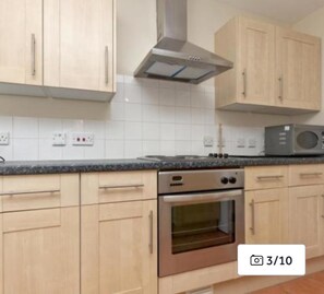 Apartamento, 1 cama de matrimonio | Cocina privada | Frigorífico, microondas, horno y placa de cocina