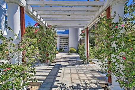 Property grounds. Stylish upstairs villa overlooking the pool