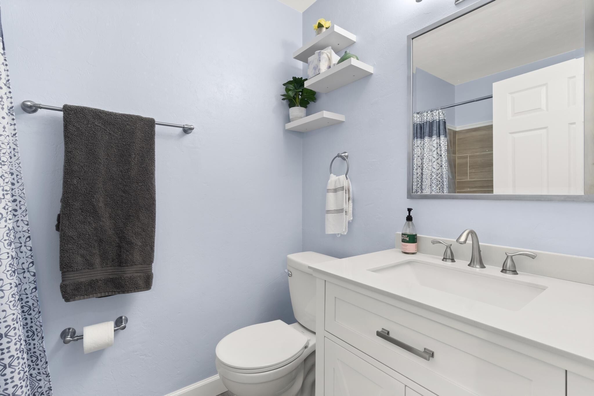 Combined shower/tub, hair dryer, towels, soap