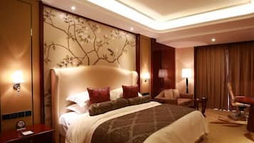 Down comforters, desk, blackout drapes, bed sheets