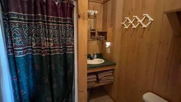 Shower, towels, toilet paper
