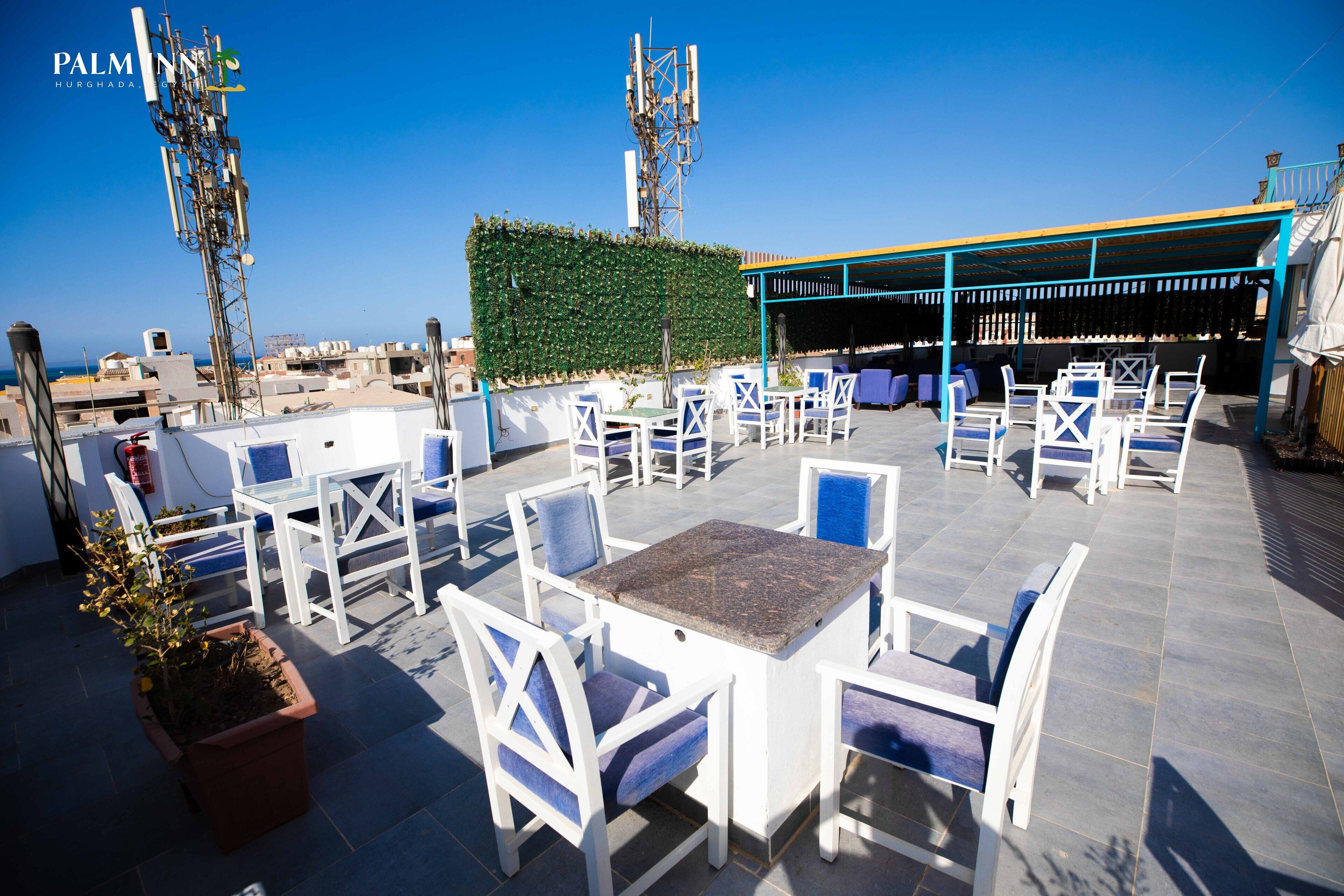 Foto - Palm Inn Suites Hotel