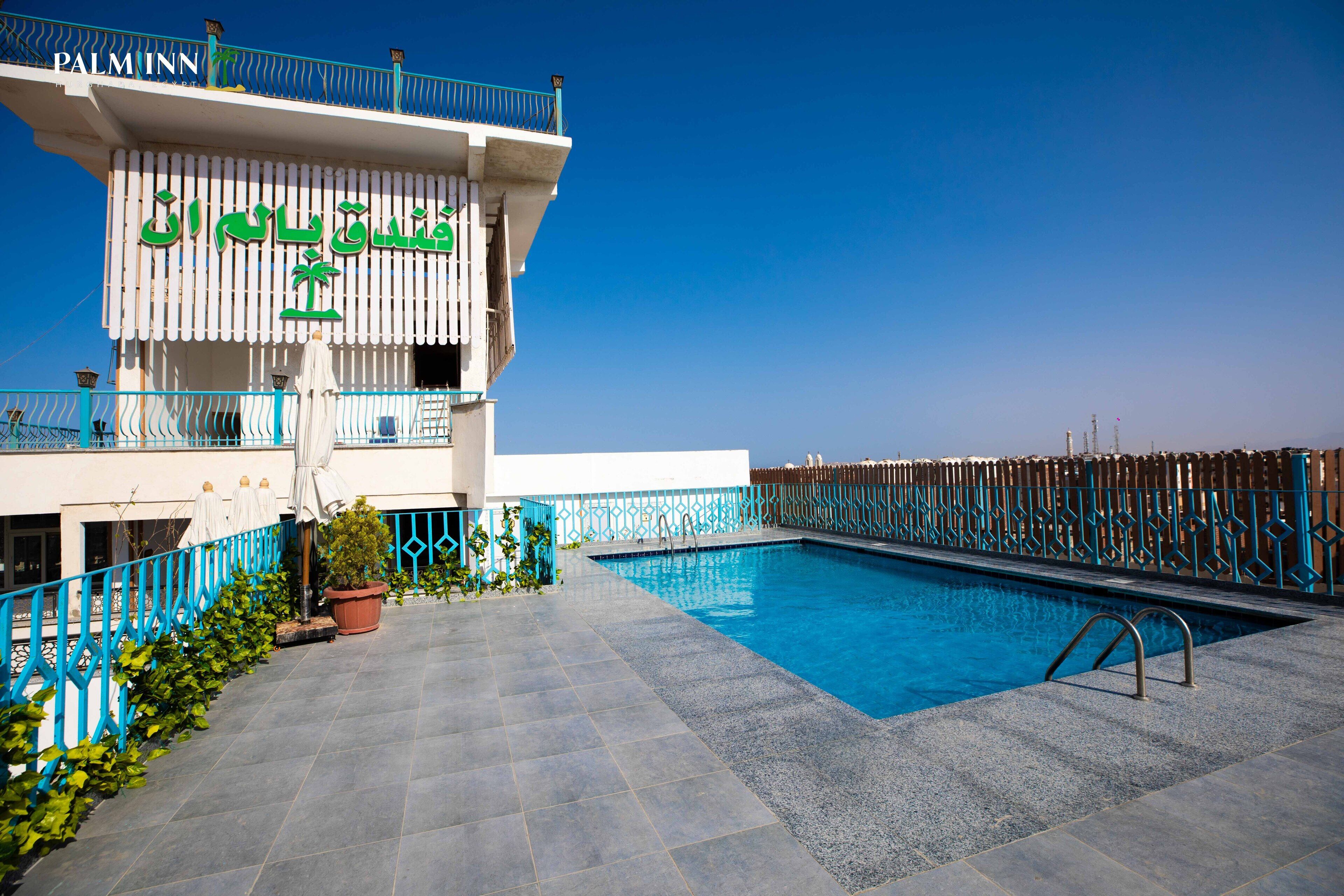 Foto - Palm Inn Suites Hotel