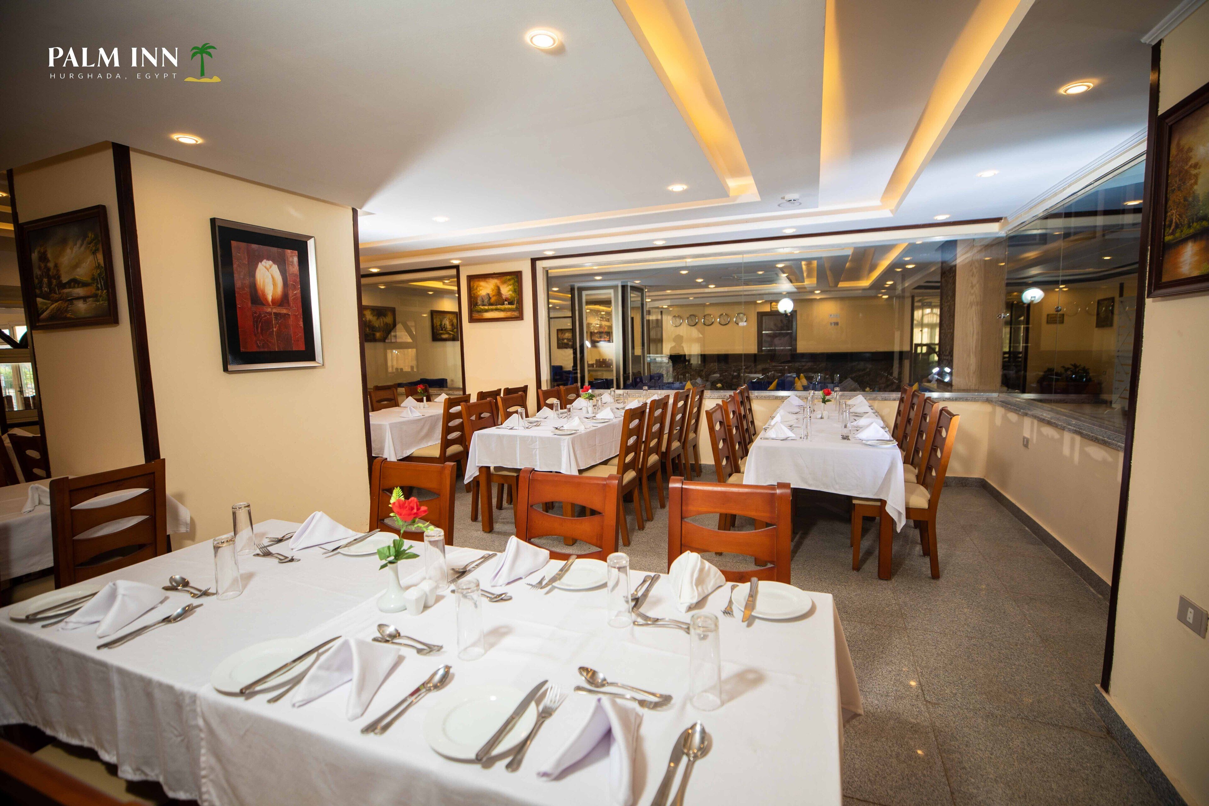 Foto - Palm Inn Suites Hotel