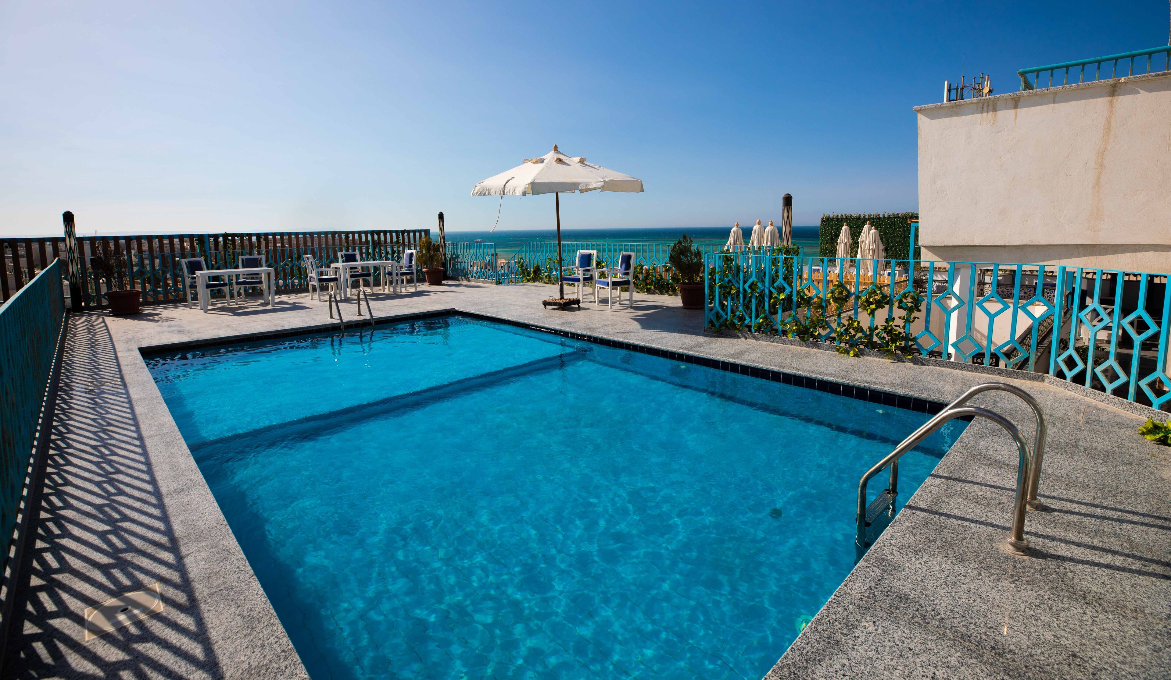 Foto - Palm Inn Suites Hotel