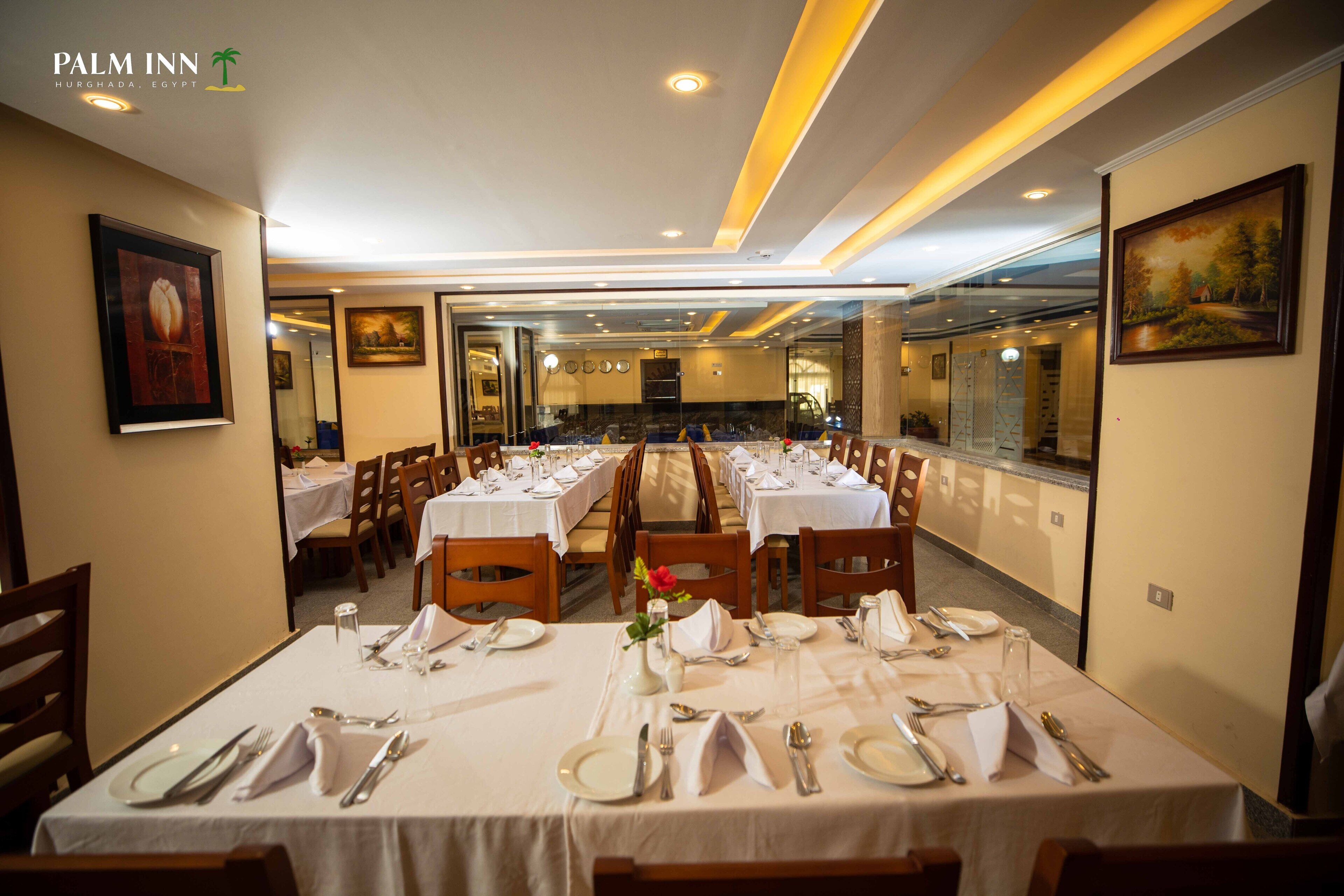 Foto - Palm Inn Suites Hotel