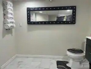Combined shower/tub