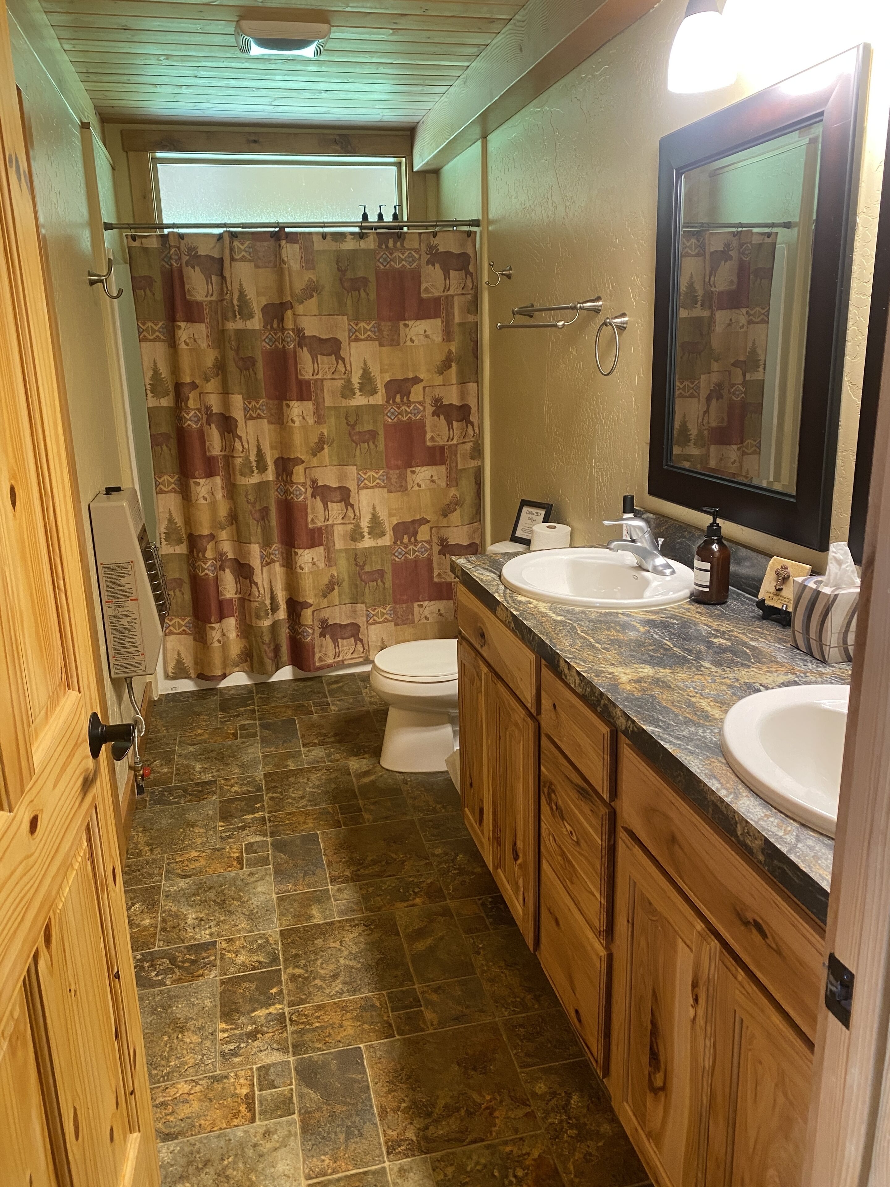 Combined shower/tub, towels, soap, shampoo