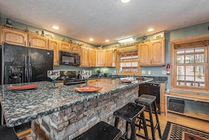 House, Multiple Beds, Fireplace | Private kitchen | Fridge, microwave, oven, stovetop