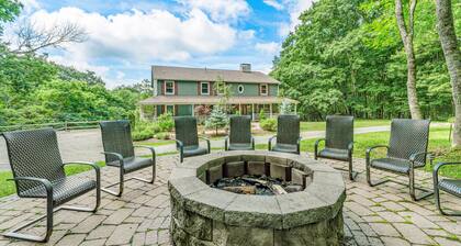 Gorgeous farmhouse with fire pit, deck, fireplace, hot tub, & game room