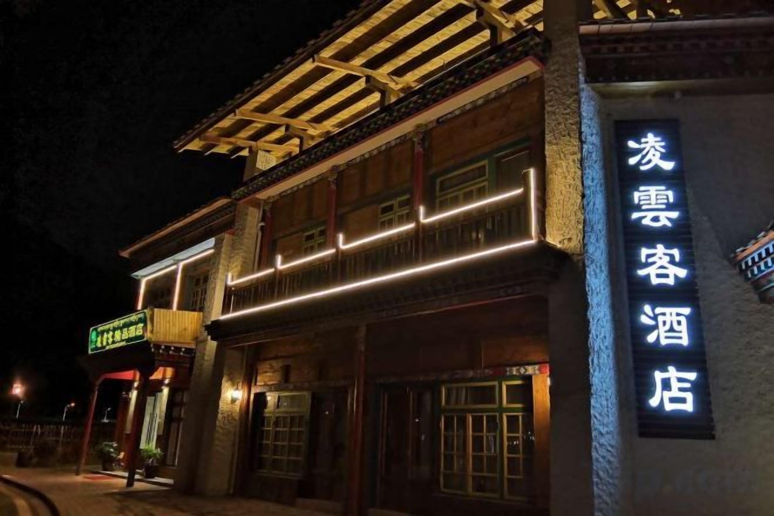 A traditional building with a sign indicating a hotel.
