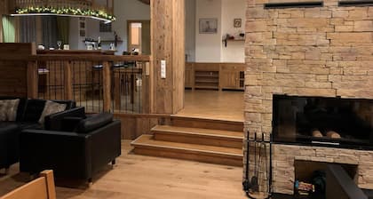 Large group house with cosy bar and large garden