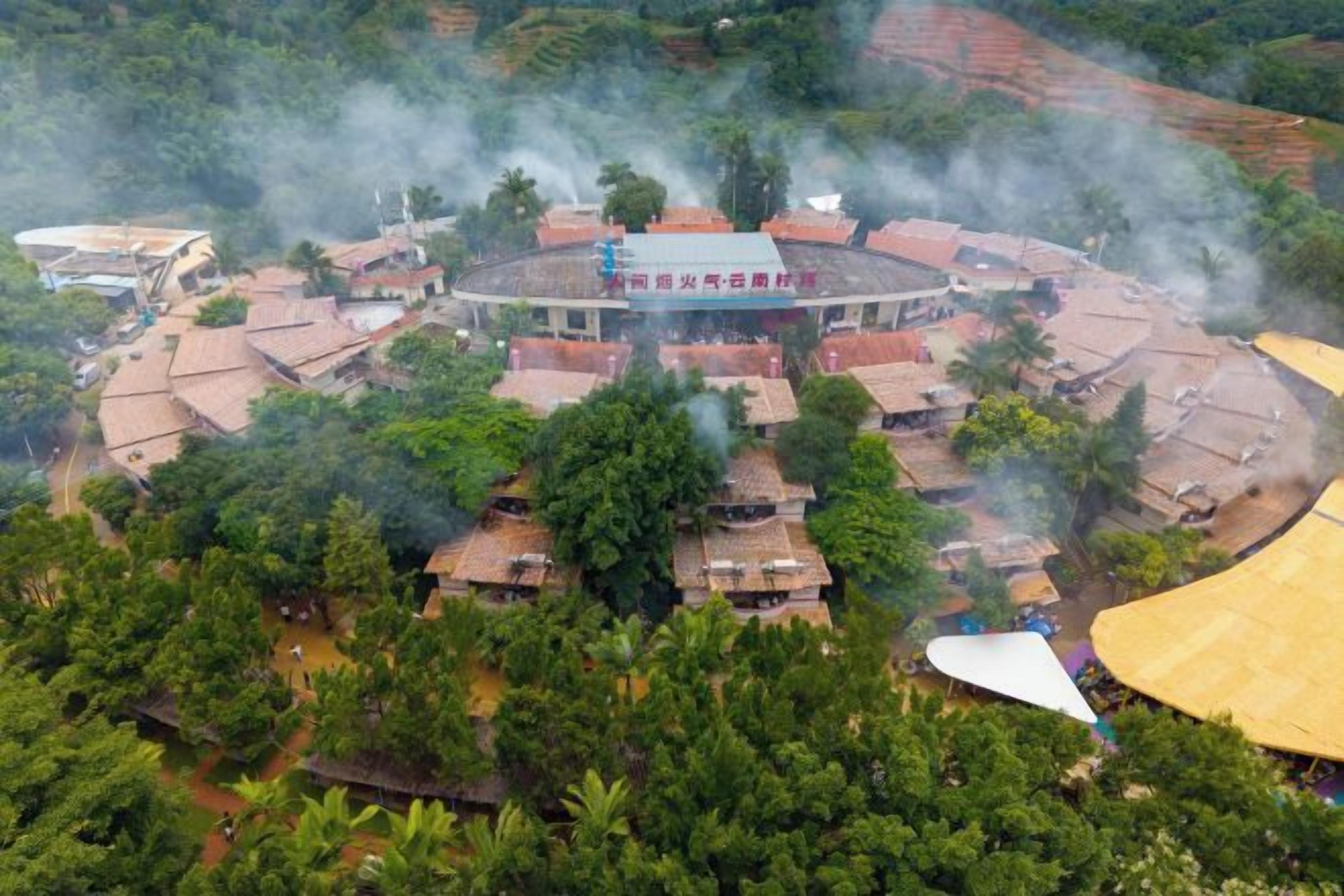 A circular building with a central courtyard surrounded by traditional-style buildings.
