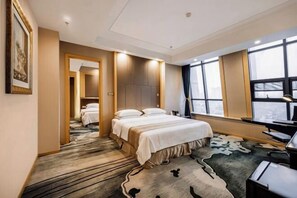 A hotel room with a large bed, a desk with a computer, and a view of the city through large windows. - Jiasheng Jinling Hotel (Nanjing)