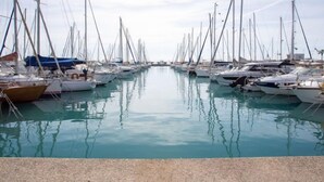 A marina with numerous sailboats docked in calm waters. - Le Phenicia by Interhome (Saint Laurent du Var)