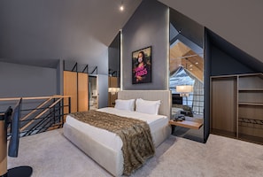 Stuga Executive | Minibar, individuell inredning, skrivbord och arbetsyta för laptop