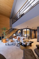 Executive-Chalet | Minibar, individuell dekoriert, Schreibtisch