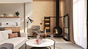 Una sala de estar moderna con un sofá, una mesa de centro y una chimenea.