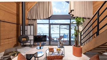 Executive-chalet | Minibaari, yksilöllisesti sisustettu, työpöytä