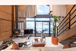 Executive-Chalet | Minibar, individuell dekoriert, Schreibtisch