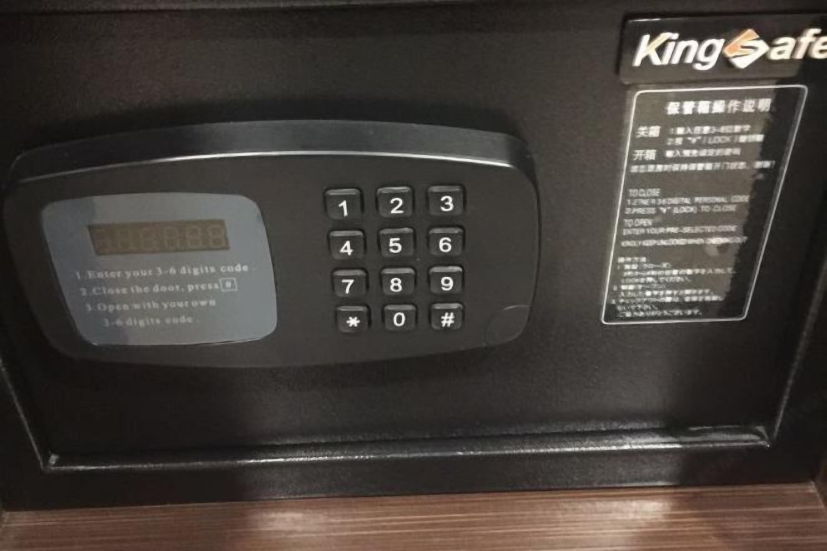 A microwave with a digital keypad and instructions for use.