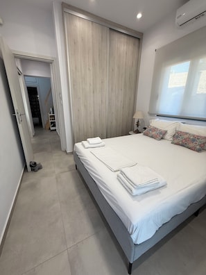 4 chambres, coffres-forts dans les chambres, fer et planche Ă repasser