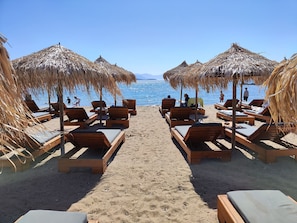 Beach nearby, sun loungers