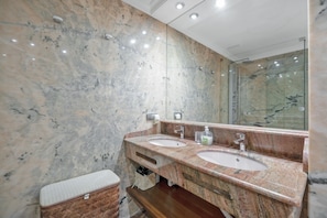Bathtub, hair dryer, towels