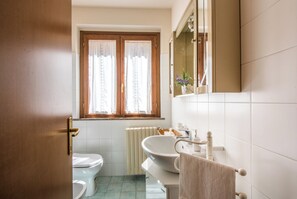 Shower, free toiletries, hair dryer, bathrobes