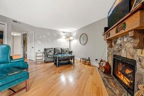 Flat-screen TV, fireplace