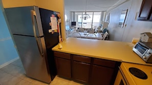 Fridge, microwave, oven, stovetop - Atlantis 1608-Oceanfront 103rd St, Pool, Elev, W/D, AC (Ocean City)