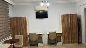 3 chambres, chambres insonorisées, fer et planche à repasser
