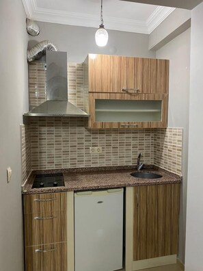 Frigobar, placa de cocina
