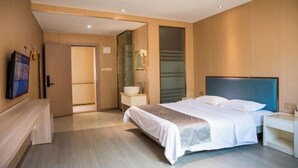A modern hotel room with a large bed, bedside tables, a TV, and a bathroom with a glass shower enclosure. - Super 8 Hotel (Xiamen Tong'an Bell Tower) (Xiamen)