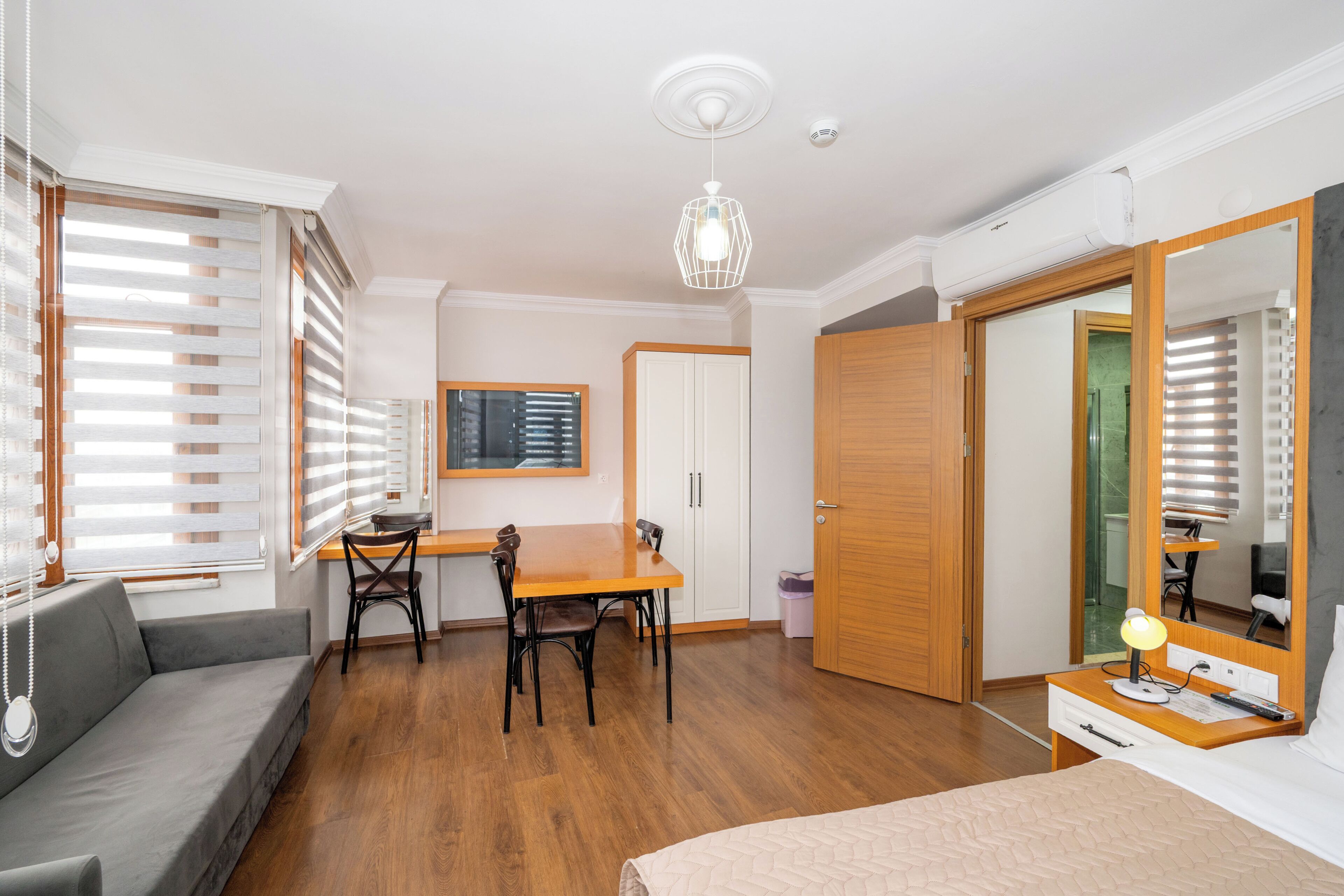 Deluxe Quadruple Room | In-room safe, desk, laptop workspace, soundproofing