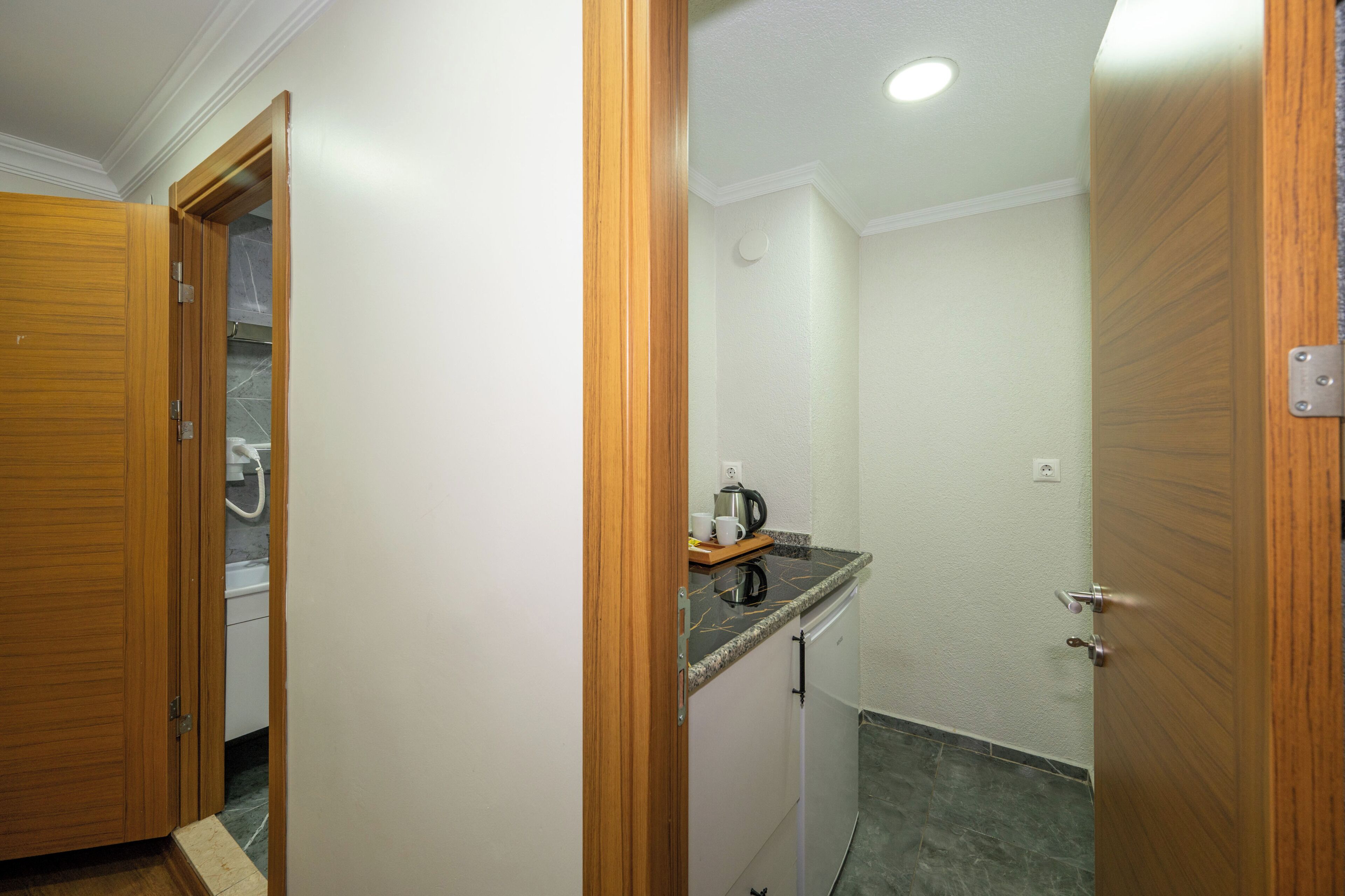 Deluxe Quadruple Room | In-room safe, desk, laptop workspace, soundproofing