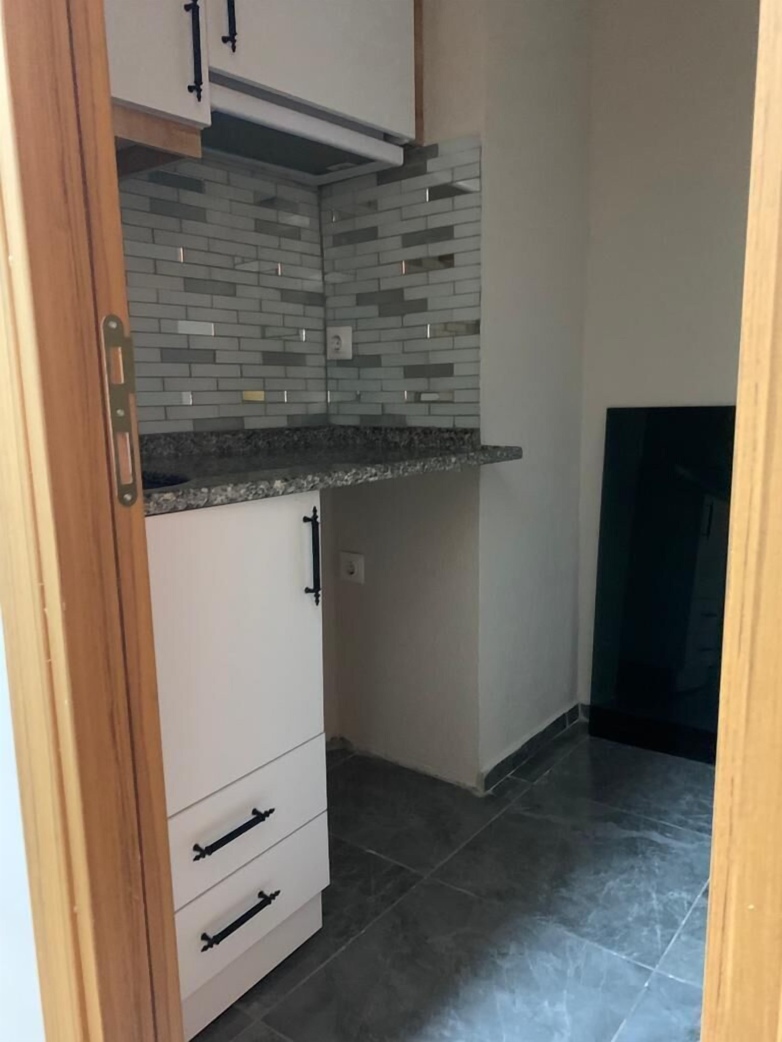 Family Suite, 2 Queen Beds | Private kitchen | Mini-fridge