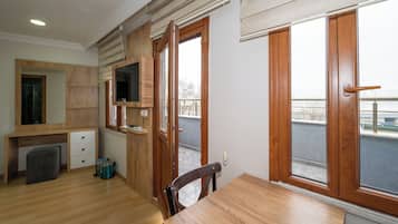 Deluxe Room, Sea View | In-room safe, desk, laptop workspace, soundproofing